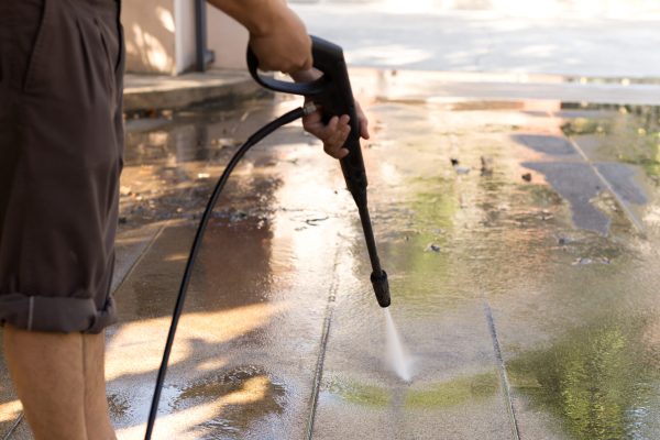 man-cleaning-stone-with-high-pressure-water-jet-at-2025-10-16-06-34-10-utc